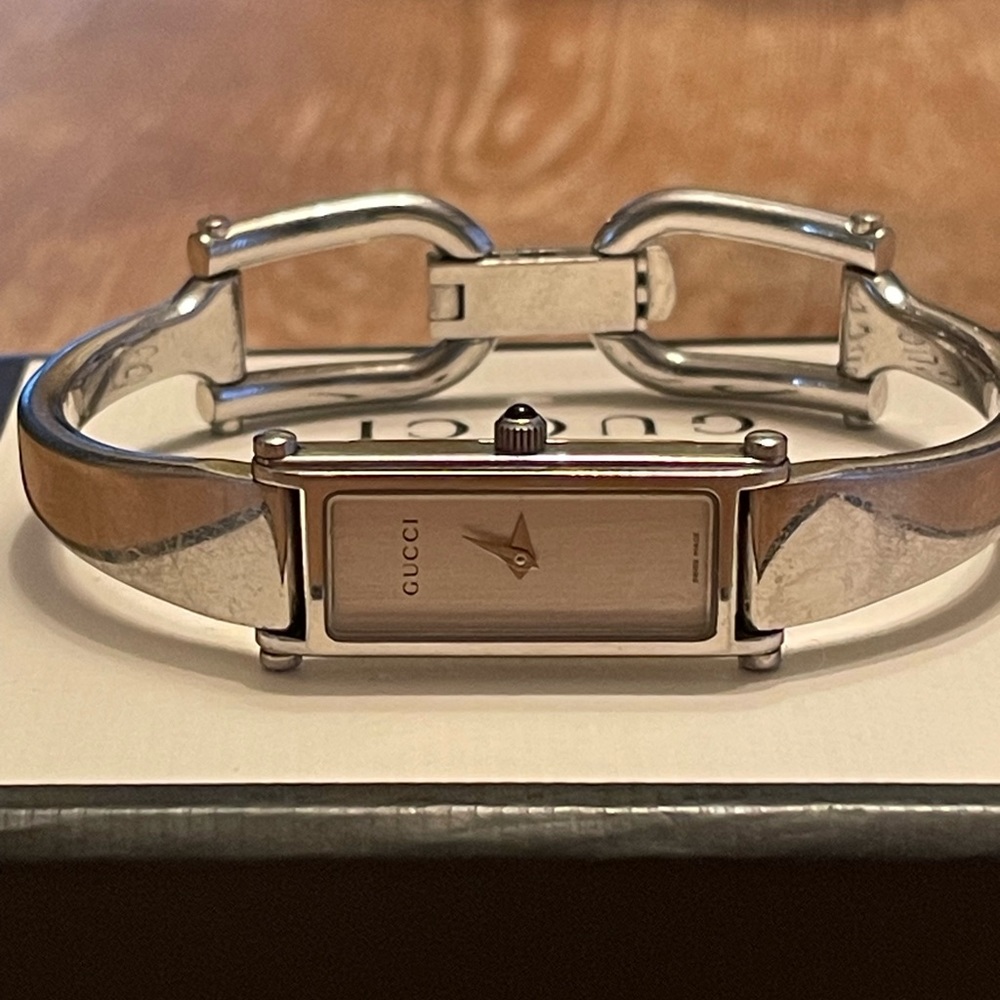 Gucci women’s bangle watch